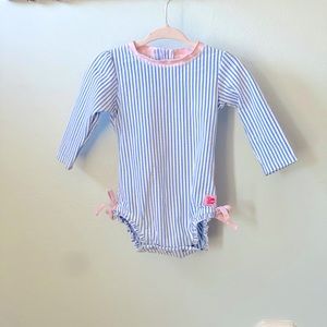 Pink and blue striped long sleeve swimsuit